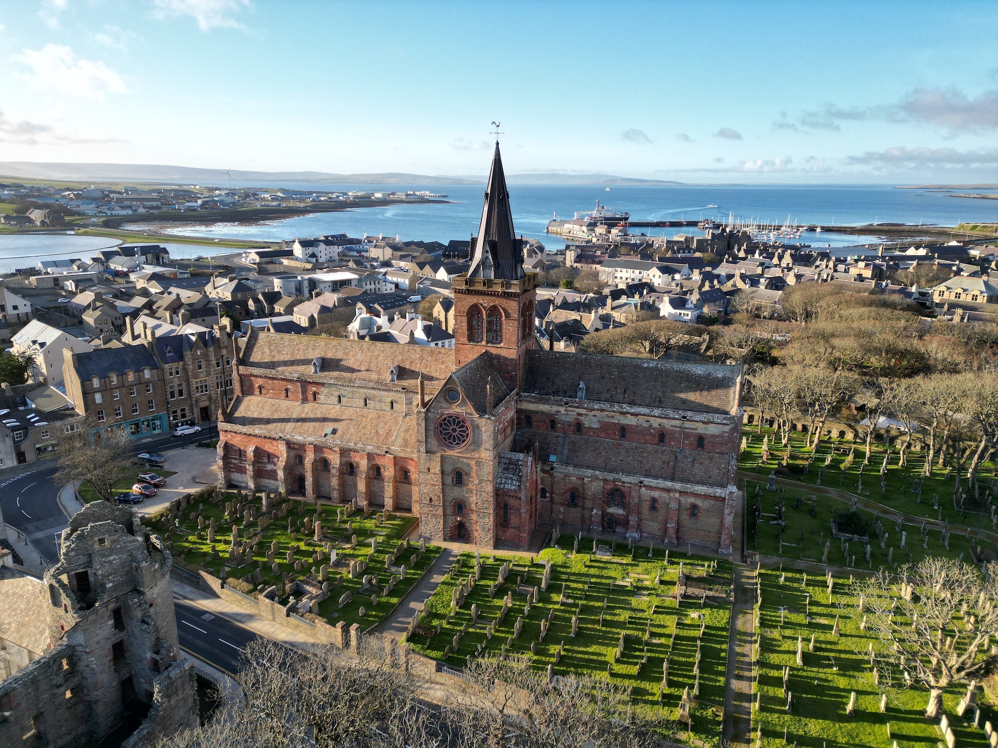 Aerial view of the St Magnus Cathedral with the cemetery on the green yard