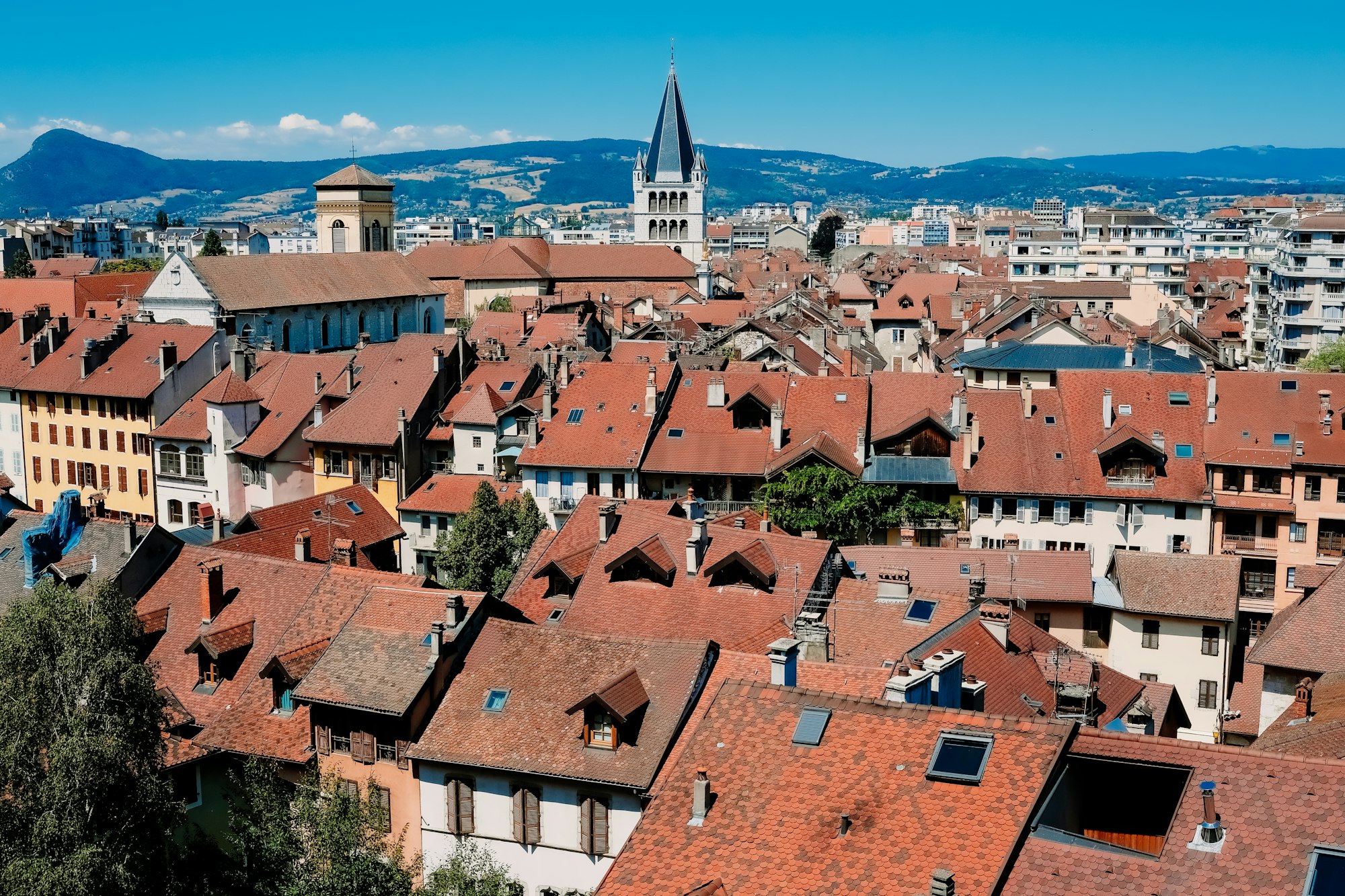 Views from above of the French city of Annecy on a sunny Sunday in summer.